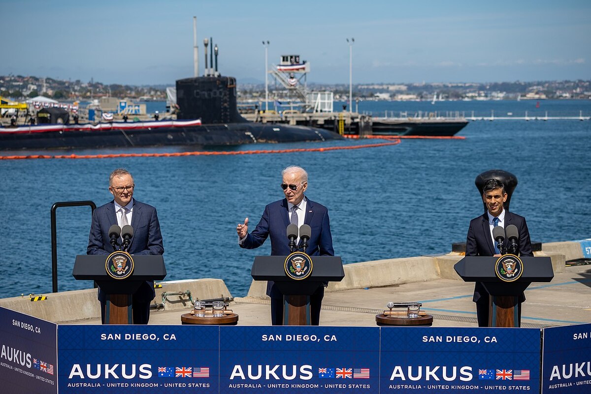 Picture: AUKUS summit in San Diego in 2023. Anthony Albanese, Joe Biden and Rishi Sunak stand behind a Virginia-class nuclear submarine | The White House