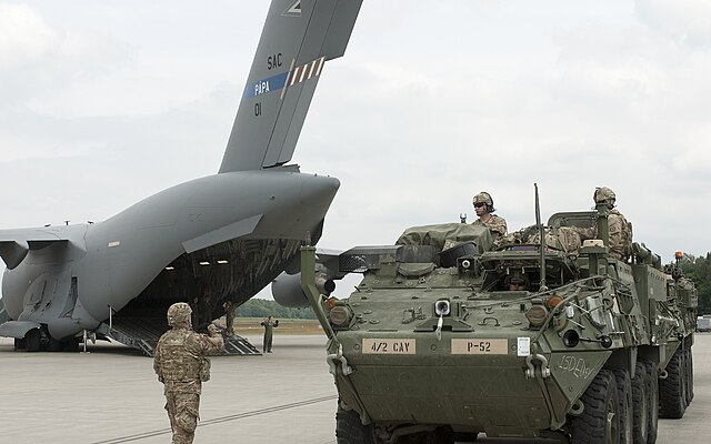Soldiers_assigned_to_2nd_Cavalry_Regiment_prepare_Strykers_to_board_a_C-17_aircraft_at_the_Nuremberg_Airport,_Germany
